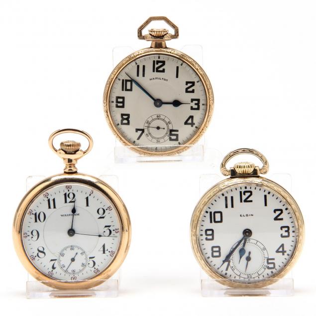 three-vintage-gold-filled-open-face-pocket-watches