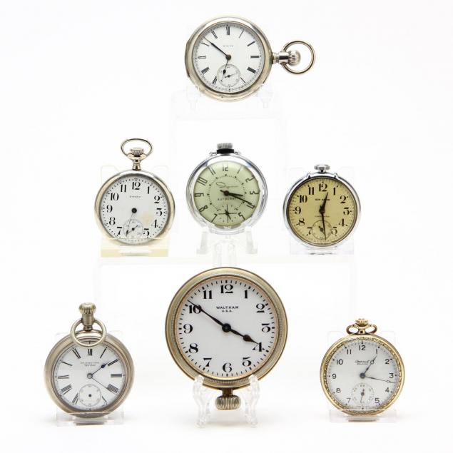 six-vintage-open-face-pocket-watches-and-an-eight-day-car-clock
