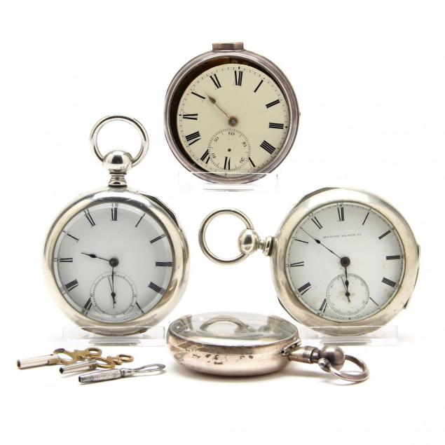 three-vintage-open-face-pocket-watches