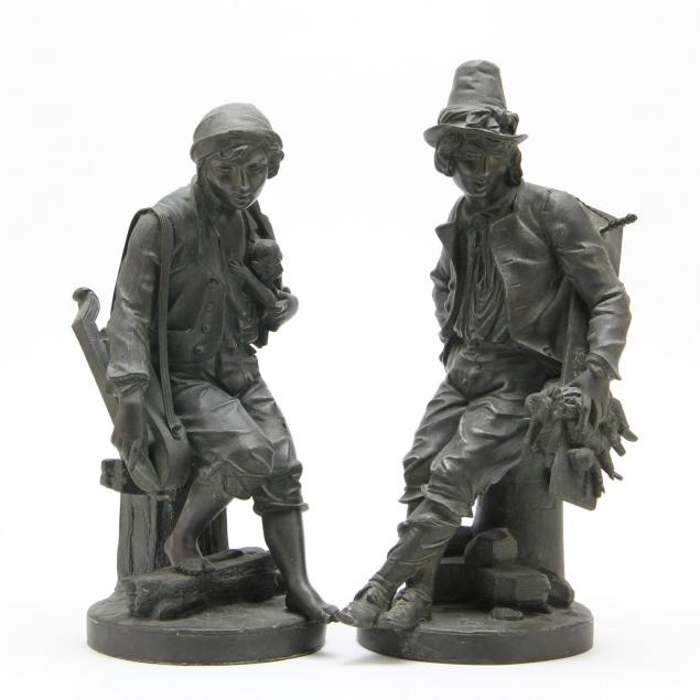 two-continental-figural-metal-sculptures