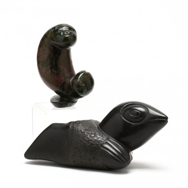 two-carved-stone-sculptures