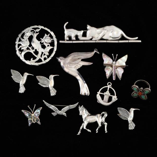 group-of-sterling-silver-jewelry-with-animals-and-insects