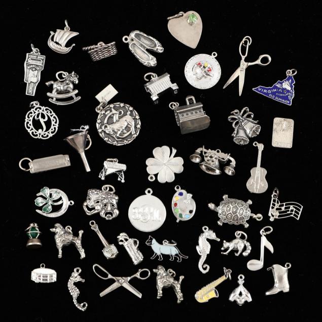 group-of-approximately-40-sterling-silver-charms