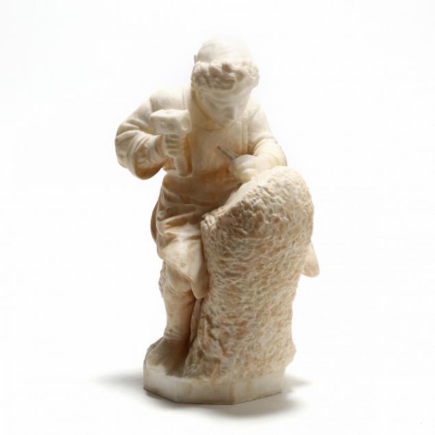 a-carved-alabaster-sculpture-of-a-sculptor