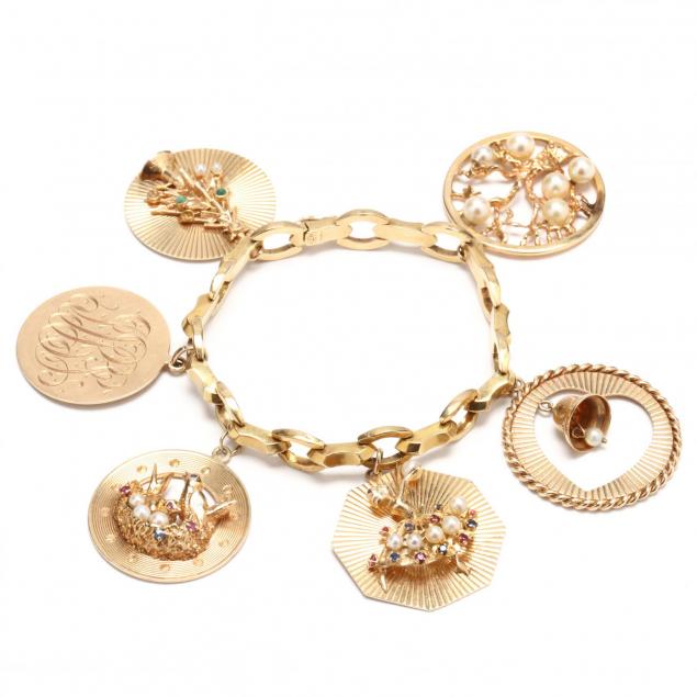 14kt-gold-charm-bracelet-with-charms