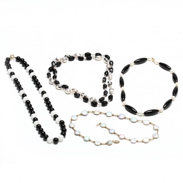 four-black-and-white-necklaces