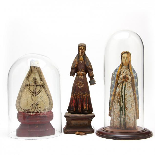 three-antique-carved-santos-figures