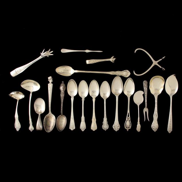 a-group-of-assorted-sterling-silver-flatware