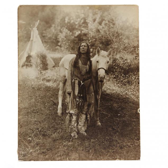 early-20th-century-photograph-of-a-plains-indian-and-his-horse