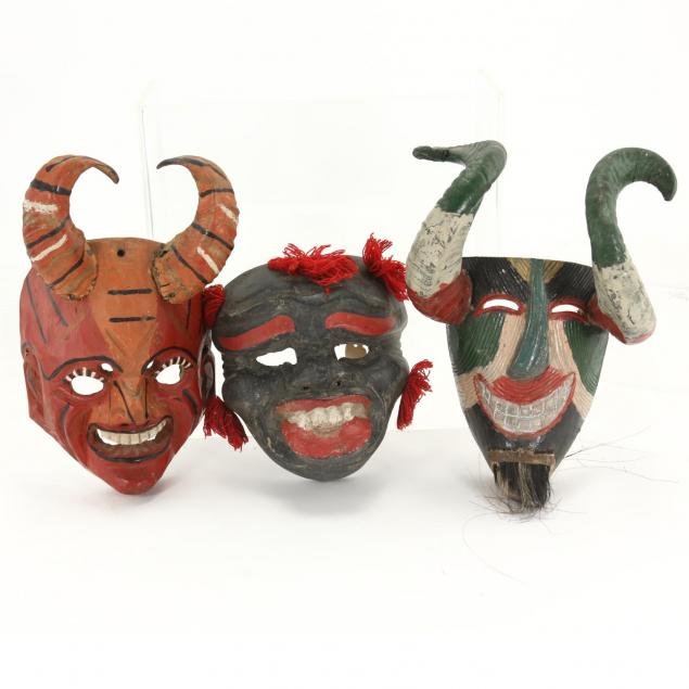 three-carved-wooden-mexican-masks
