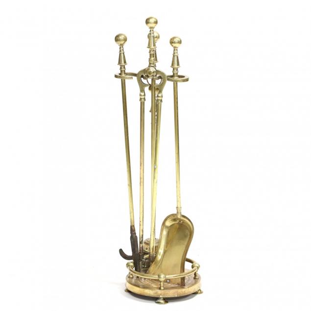an-antique-brass-fire-tool-set