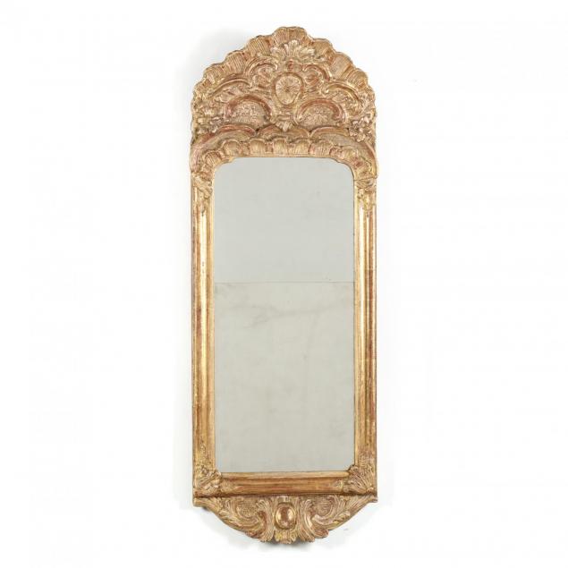 a-highly-carved-and-gilded-french-wall-mirror