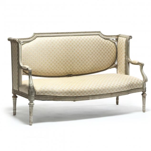 an-italianate-carved-and-painted-upholstered-settee