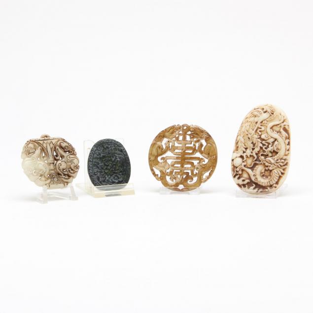 four-chinese-carved-hardstone-pendants