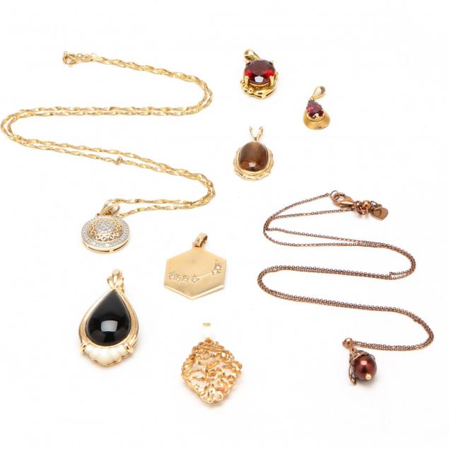 eight-gold-pendants-and-necklaces