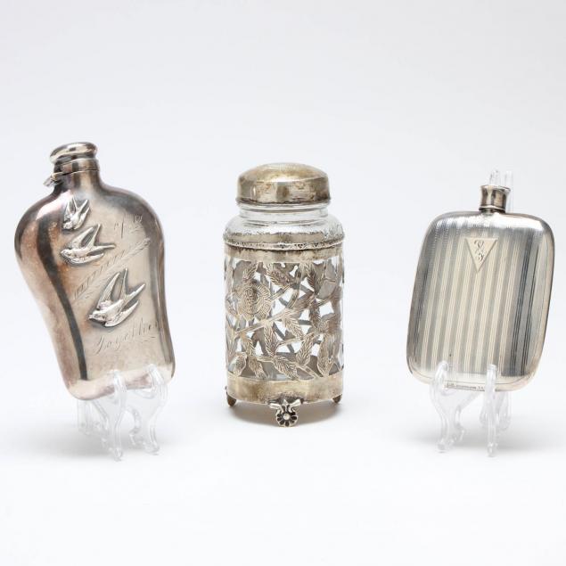 two-silver-flasks-and-overlay-bottle