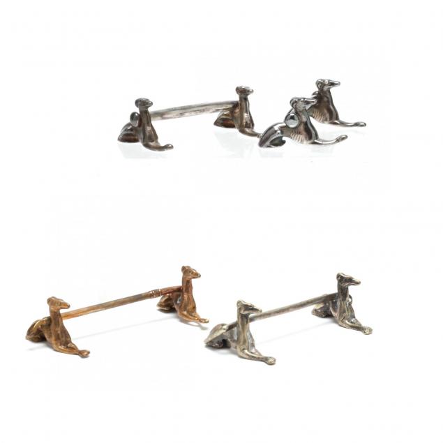 a-group-of-four-seated-whippet-knife-rests