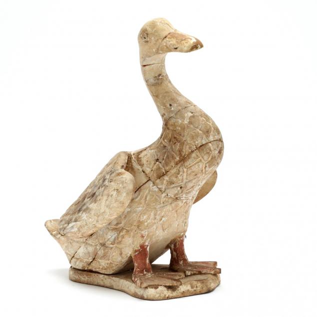 a-carved-and-painted-wood-duck