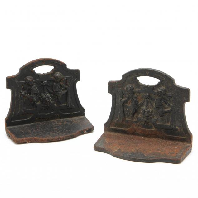judd-pair-of-figural-iron-bookends