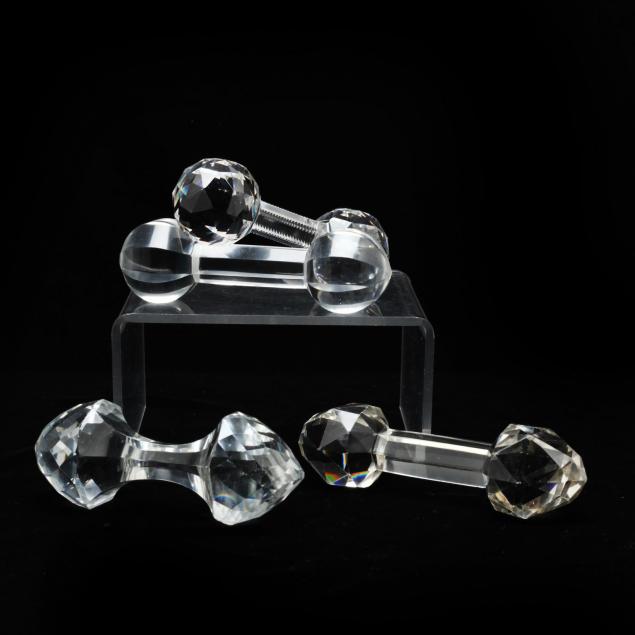 a-group-of-four-crystal-knife-rests