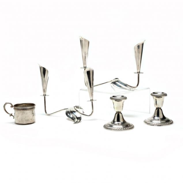 two-pairs-of-silver-candlesticks-and-a-sterling-child-s-cup