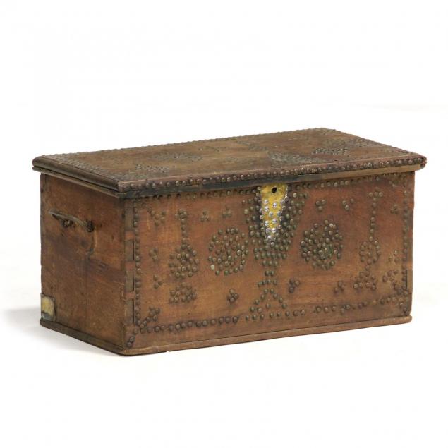 brass-tacked-decorative-trunk