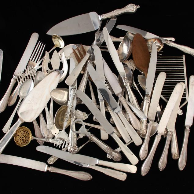 a-large-group-of-sterling-silver-flatware