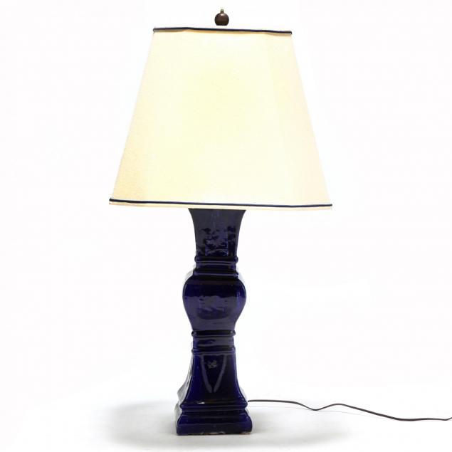 a-cobalt-blue-ceramic-lamp-with-linen-shade