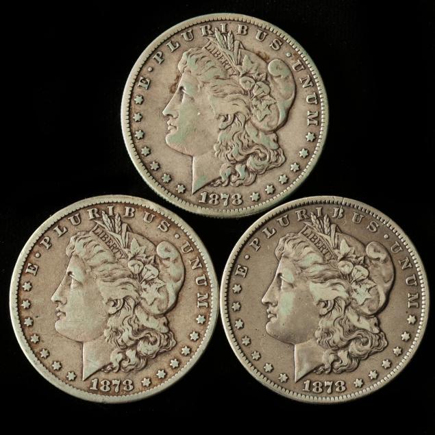 three-1878-cc-morgan-silver-dollars-with-traces-of-pvc