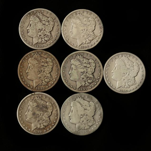 seven-carson-city-morgan-silver-dollars-with-traces-of-pvc