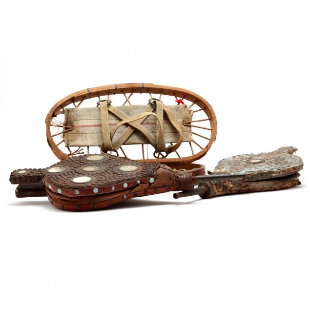 a-pair-of-vintage-snow-shoes-and-two-antique-bellows
