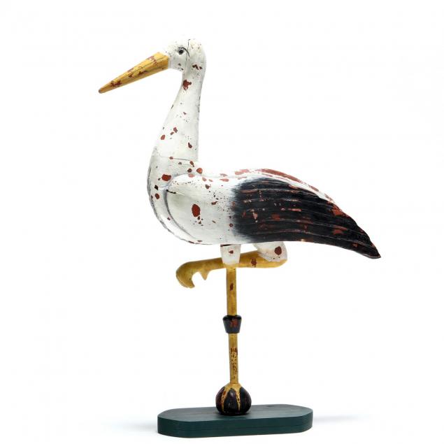 folk-art-sculpture-of-a-stork