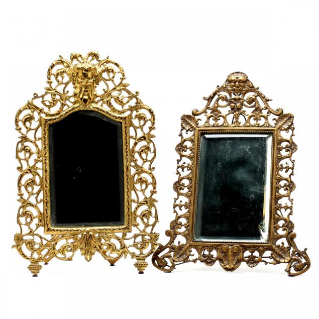 two-antique-brass-framed-vanity-mirrors