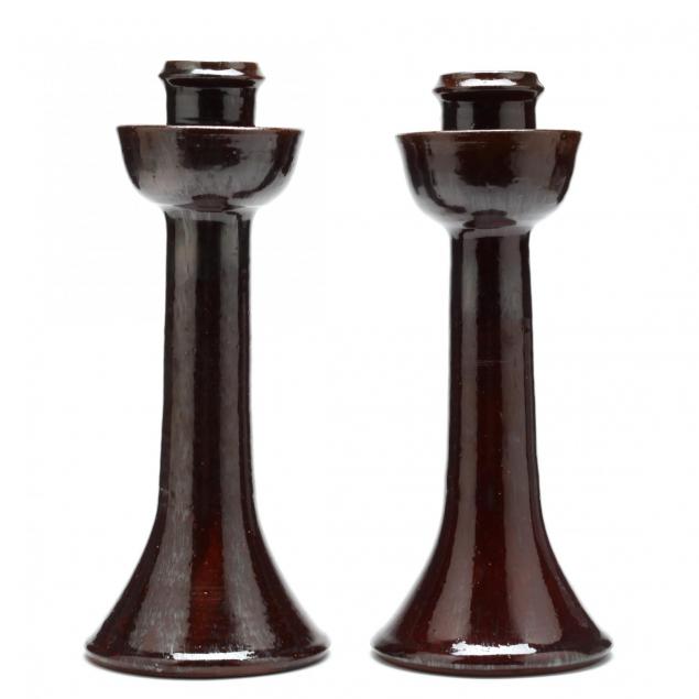 a-pair-of-ben-owen-master-potter-candlesticks