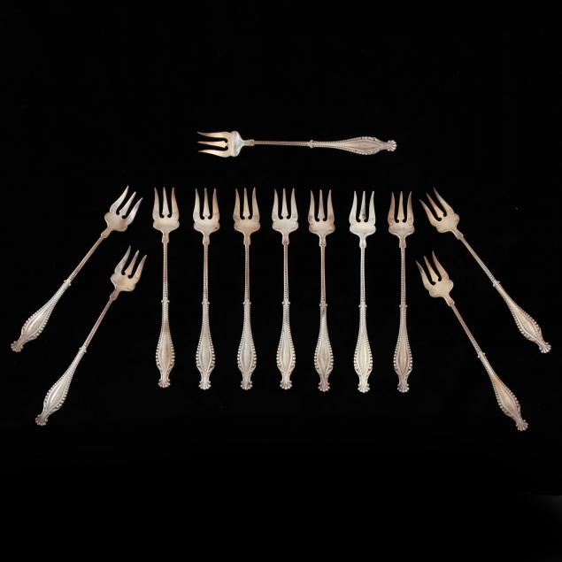 a-set-of-twelve-sterling-silver-seafood-cocktail-forks-by-gorham