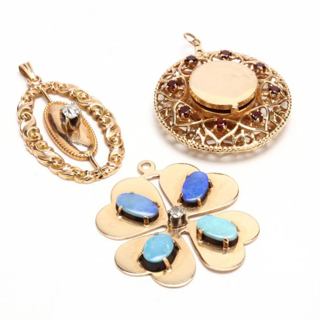 three-vintage-gold-and-gem-set-pendants