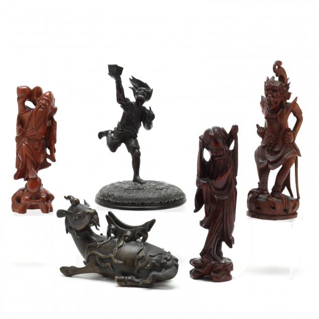 a-group-of-asian-decorative-sculptures