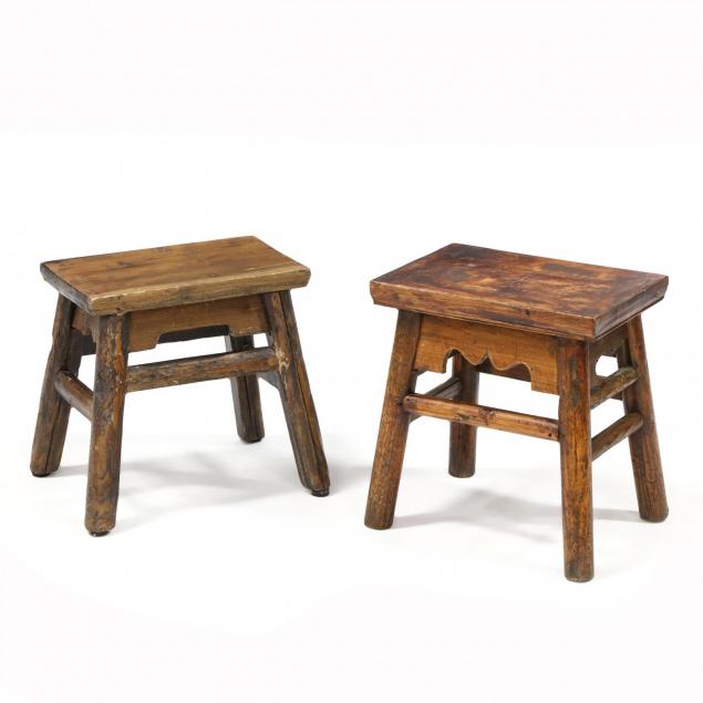 two-similar-splayed-leg-foot-stools