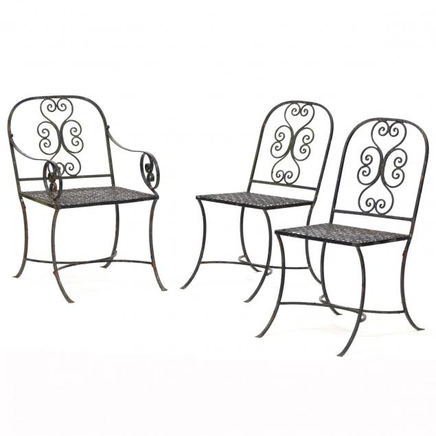 three-vintage-wrought-iron-chairs