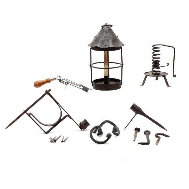 group-of-wrought-iron-candle-holders-and-household-accessories