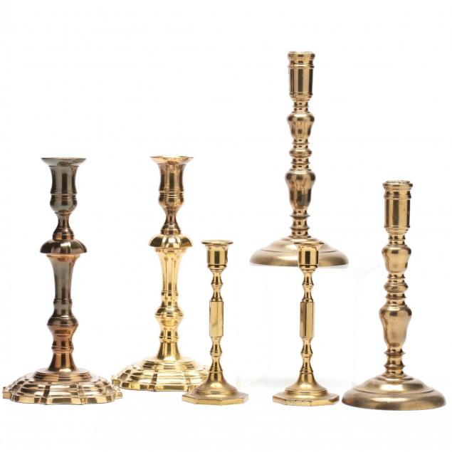 three-pairs-of-brass-candlesticks