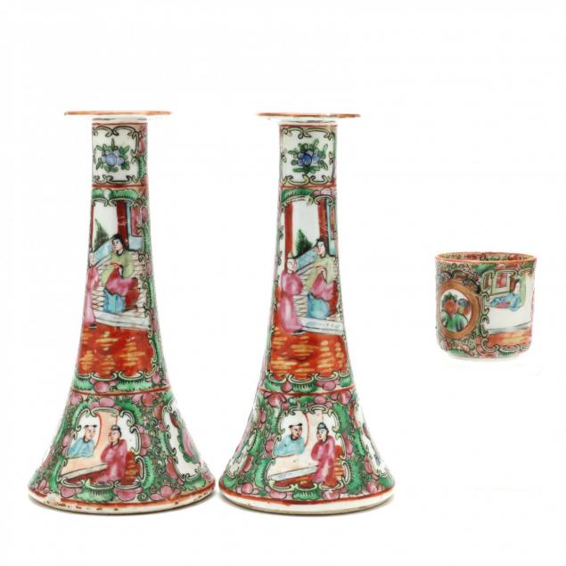 a-pair-of-chinese-porcelain-famille-rose-candlesticks-and-small-cup