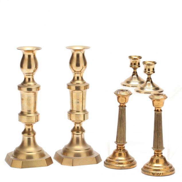 three-pairs-of-brass-candlesticks