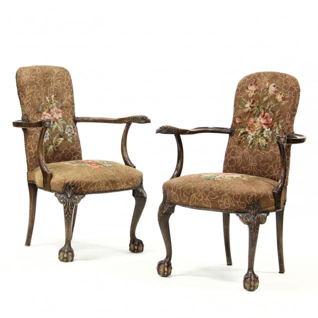 pair-of-transitional-carved-arm-chairs