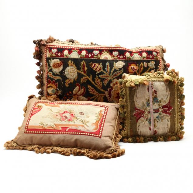 three-antique-needlework-pillows