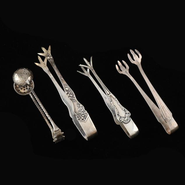 four-sterling-silver-sugar-tongs
