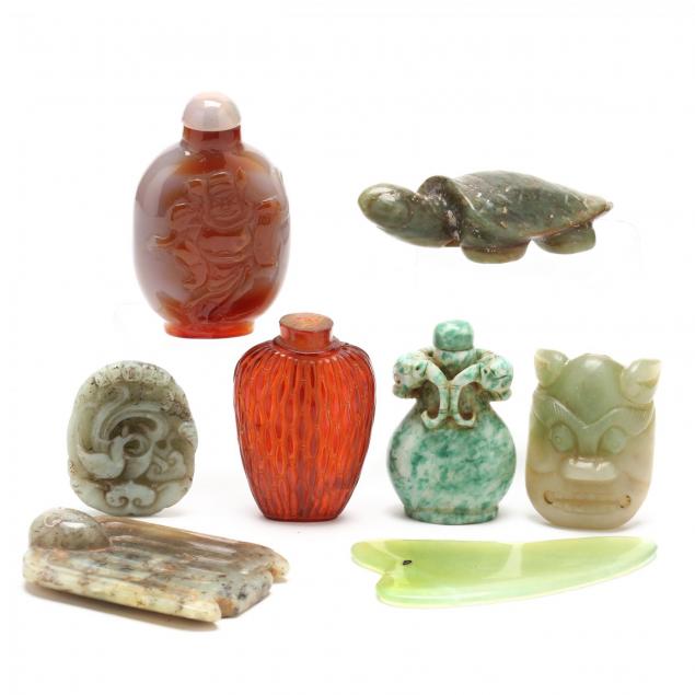 a-group-of-chinese-bottles-and-decorative-items