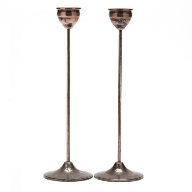 a-pair-of-tall-modernist-sterling-silver-candlesticks