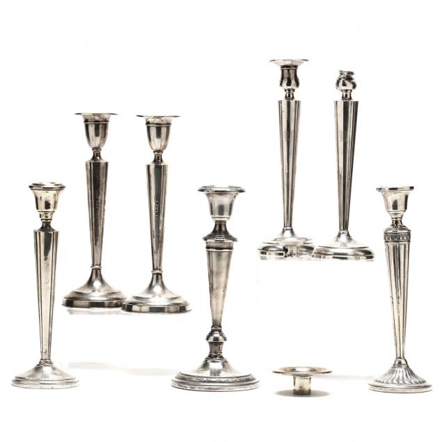 group-of-seven-sterling-silver-candlesticks