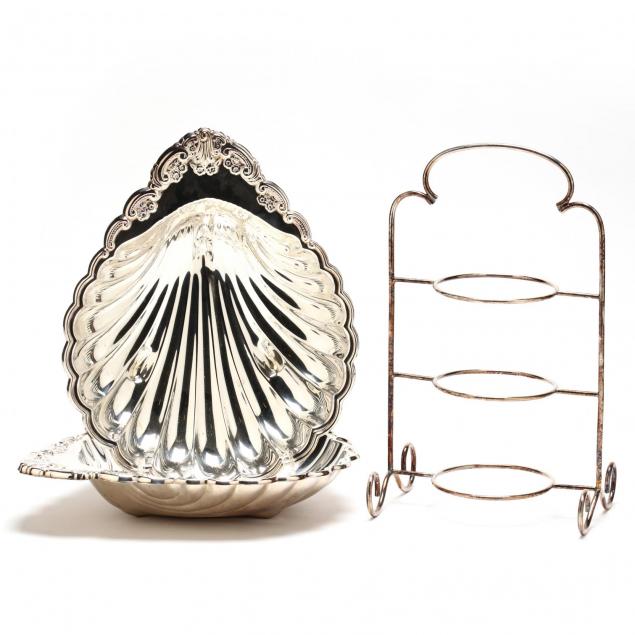 a-pair-of-large-silverplate-shell-dishes-and-a-plate-stand